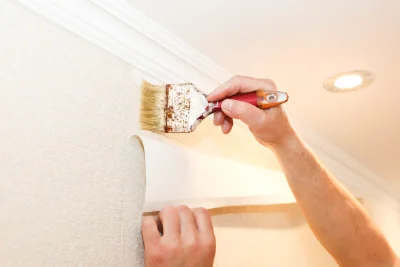 Pose de papier peint à Firmi — revêtements muraux et toiles de verre